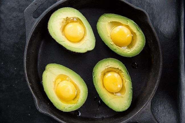 Add your egg right into the hole left by the Avocado pit.