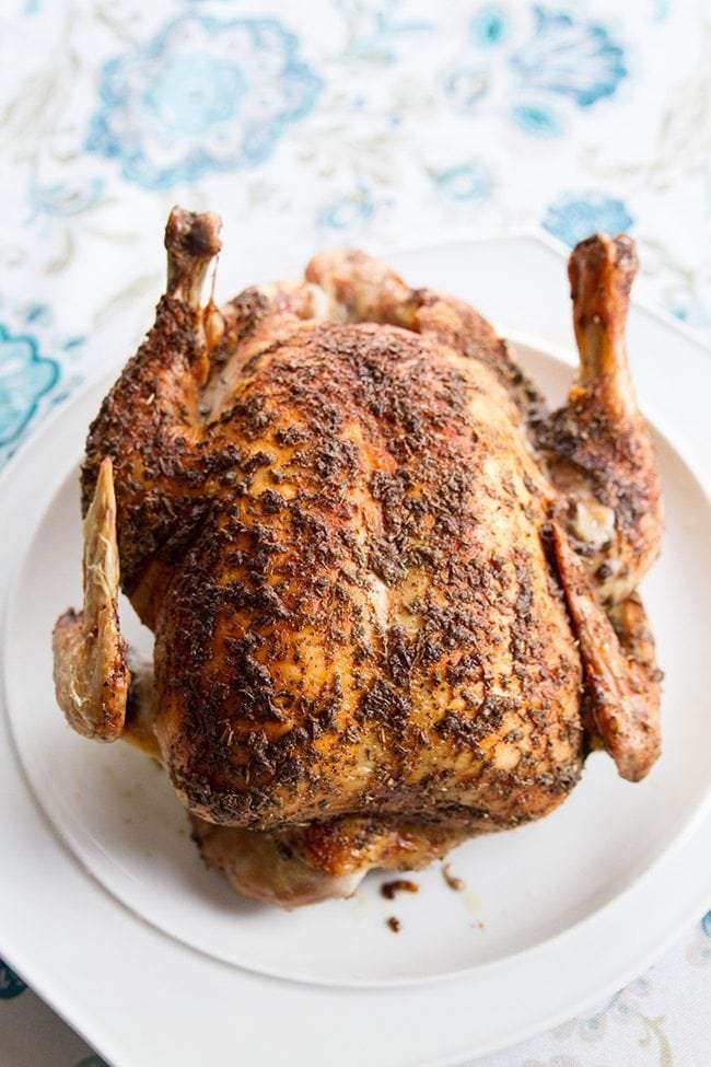 Herb & Butter Roasted Low Carb Chicken on a White Platter