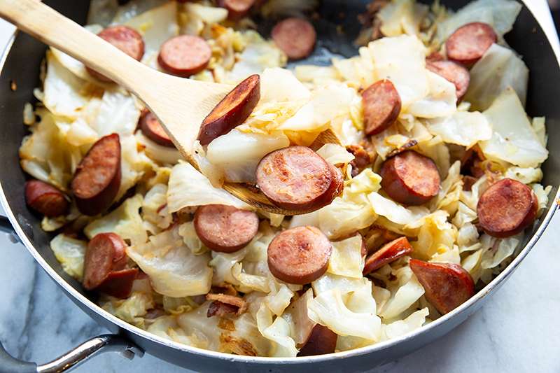 Fried Cabbage with Kielbasa in a Skillet