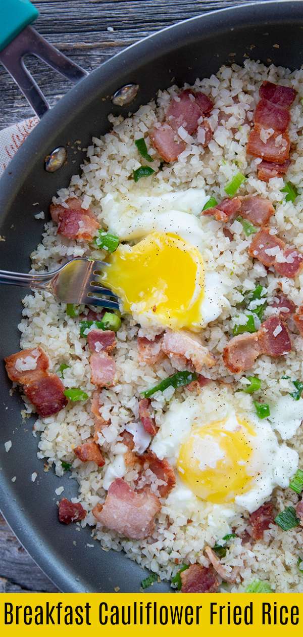 Up your vegetable intake first thing in the morning with this fast & delicious Keto/Low Carb Bacon and Egg Breakfast Cauliflower Fried Rice Recipe! #keto #lowcarb #breakfast #cauliflower #healthy #eggs #brunch #ricedcauliflower #cauliflowerfriedrice 